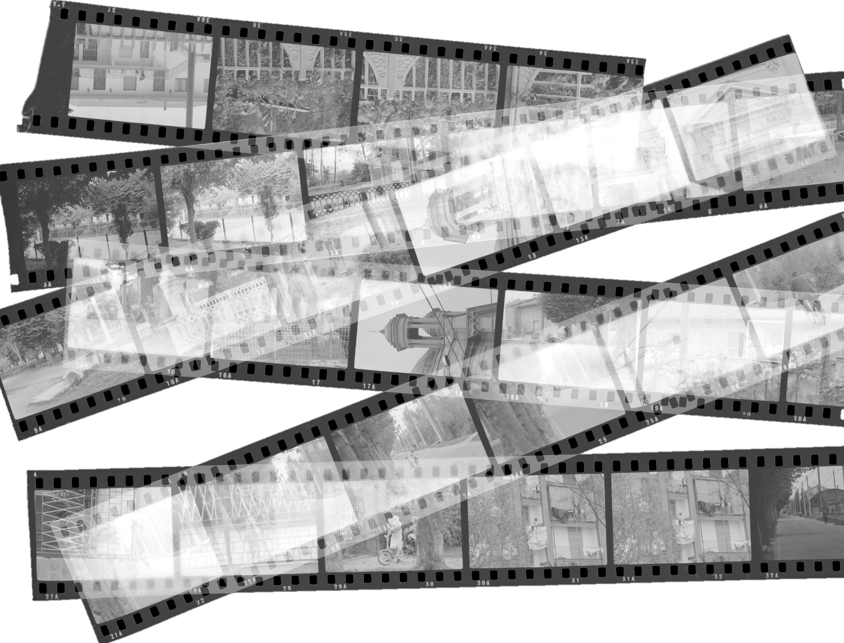 Complete vintage photographic film strips held to the light